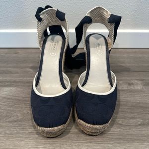 Coach navy and white cork 4” wedge he’ll sandal. Size 9 Excellent condition